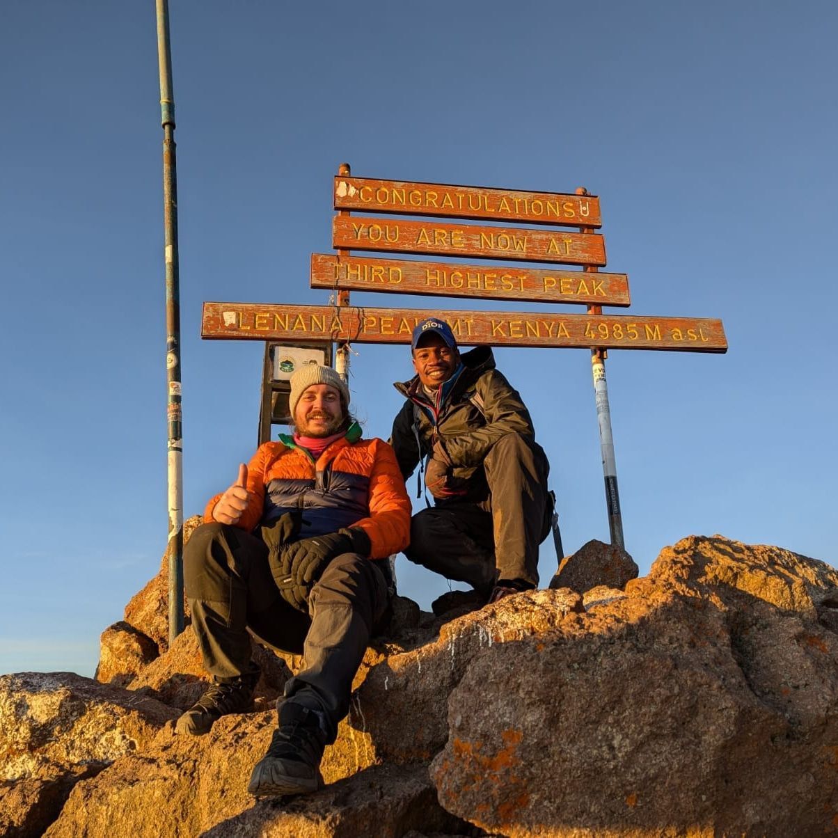 Guide and trekker at Point Lenana